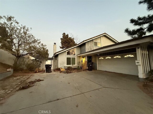 view of front of property featuring a garage