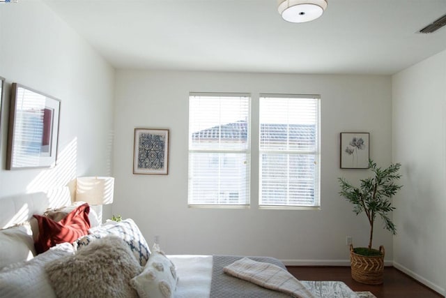 bedroom featuring dark hardwood / wood-style floors