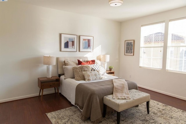 bedroom featuring dark hardwood / wood-style floors