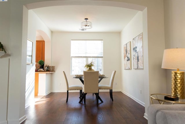 dining room featuring dark hardwood / wood-style flooring