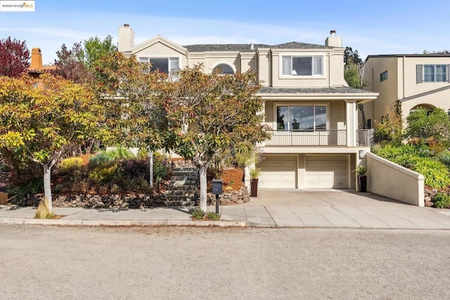 view of front of home with a garage