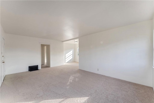 empty room featuring carpet flooring