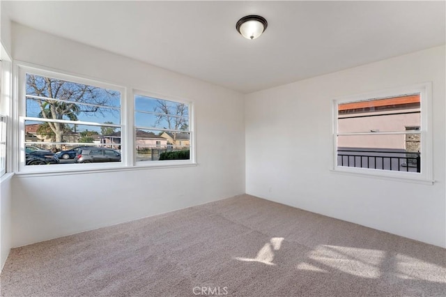 view of carpeted spare room