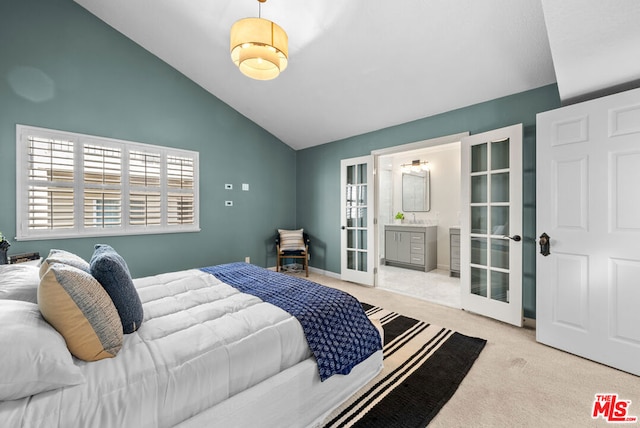 bedroom with vaulted ceiling, light carpet, and french doors