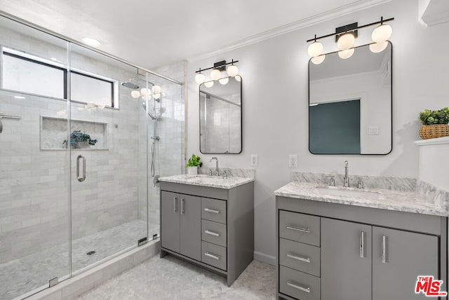 bathroom featuring crown molding, vanity, and a shower with shower door