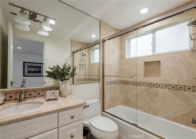 full bathroom with toilet, combined bath / shower with glass door, backsplash, and vanity