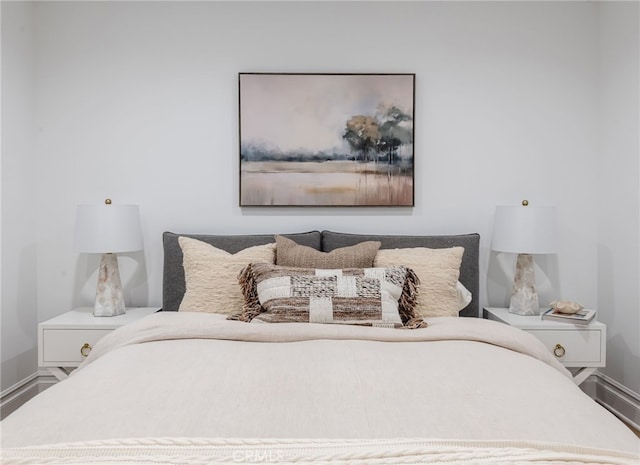 bedroom featuring baseboards