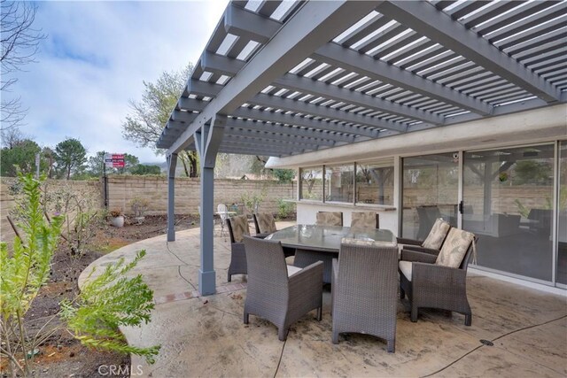 view of patio featuring a pergola