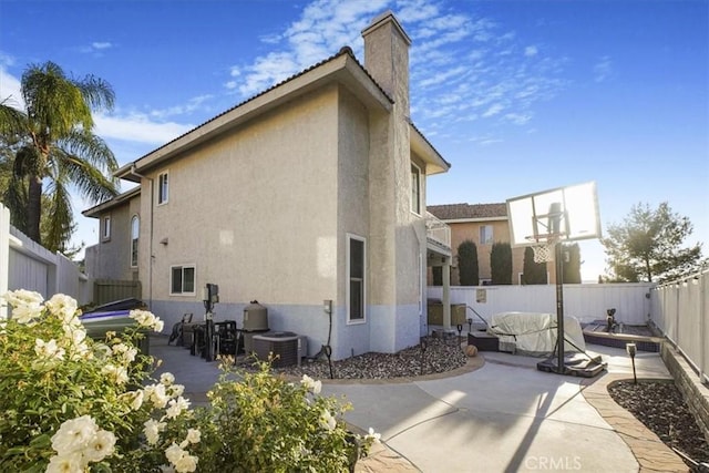 rear view of house with a patio