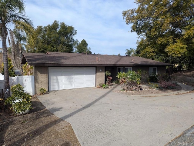 ranch-style house featuring a garage