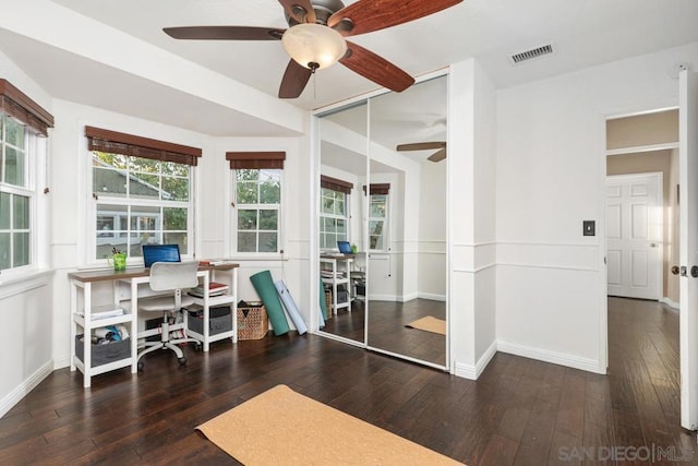 office space with ceiling fan and dark hardwood / wood-style floors