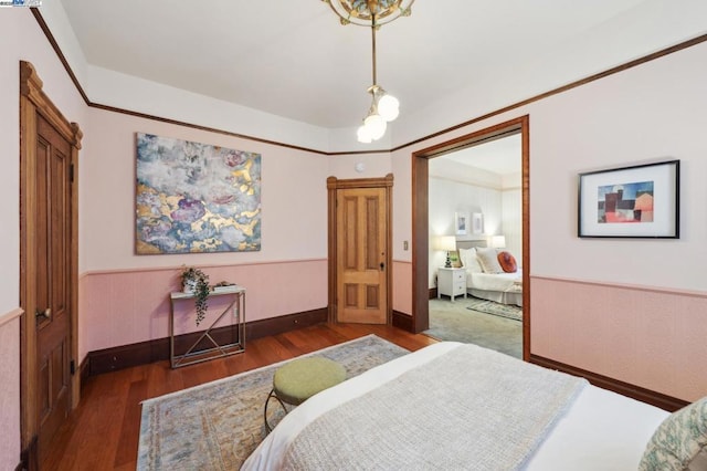 bedroom featuring dark hardwood / wood-style flooring