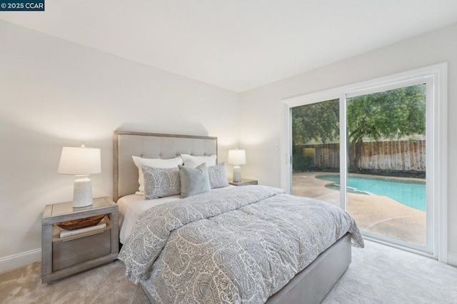 bedroom featuring carpet floors and access to exterior