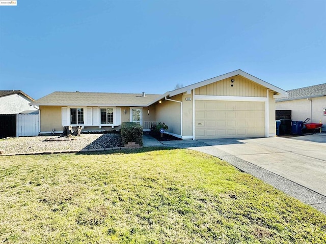 ranch-style house featuring a garage and a front lawn