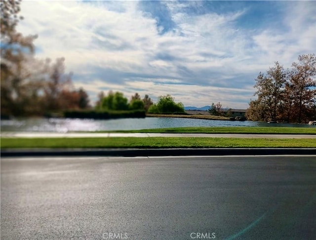 view of street featuring a water view