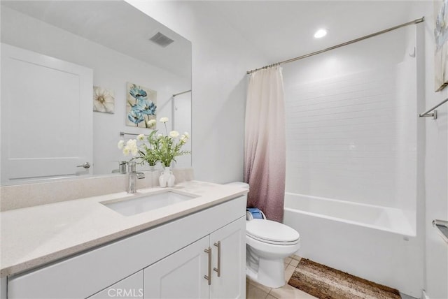 full bathroom with shower / bathtub combination with curtain, vanity, tile patterned floors, and toilet