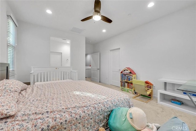 carpeted bedroom with ceiling fan