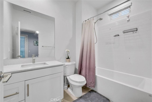 full bathroom with vanity, toilet, and shower / bath combo