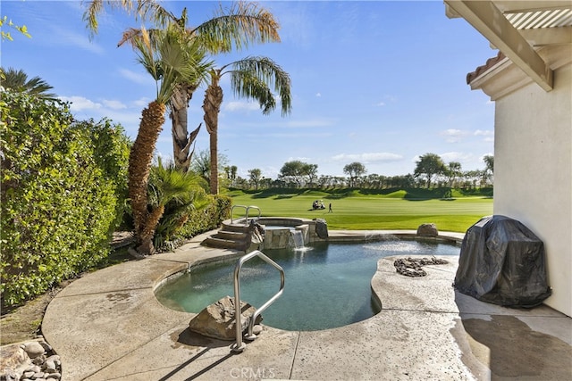 view of pool featuring a patio, a lawn, an in ground hot tub, pool water feature, and a pergola