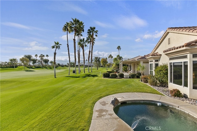 exterior space featuring a hot tub and a yard