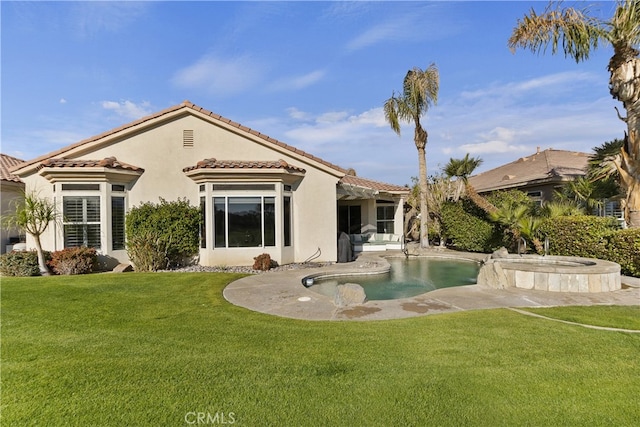 back of house with a yard and a patio area