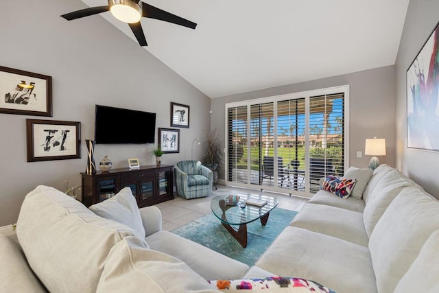 living room featuring ceiling fan, high vaulted ceiling, and light tile patterned floors