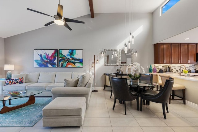 living room with light tile patterned flooring, high vaulted ceiling, sink, ceiling fan, and beam ceiling