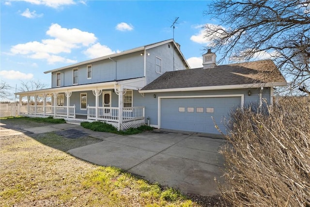 view of front of home with a garage and covered porch