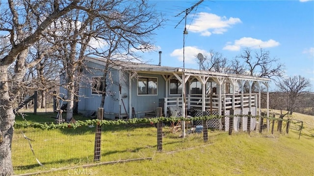 view of front of home with a front yard