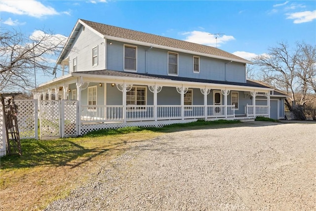 farmhouse inspired home with covered porch