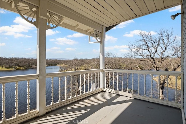 balcony featuring a water view