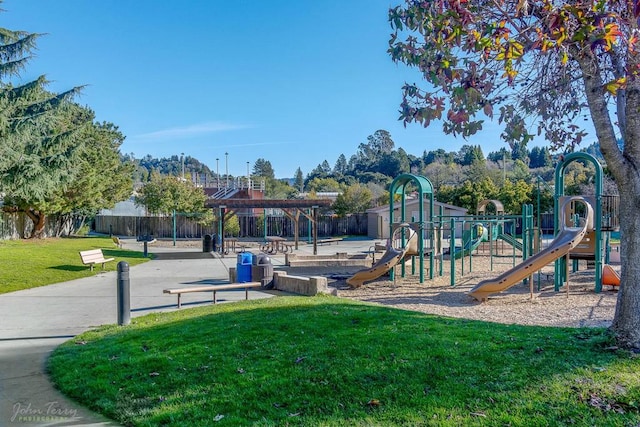 view of jungle gym with a yard