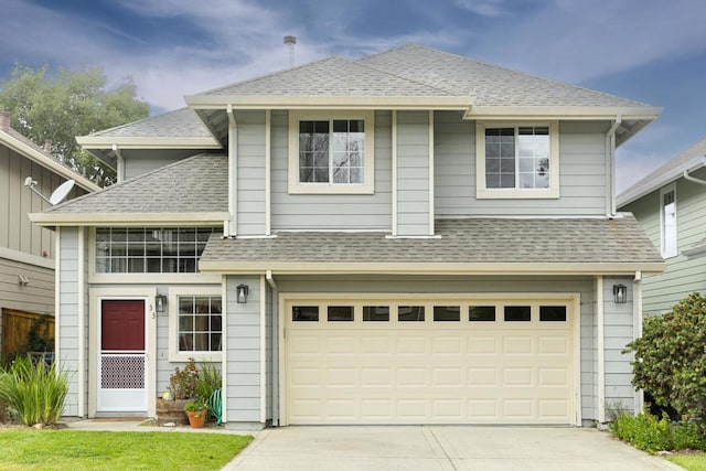 view of front of property with a garage