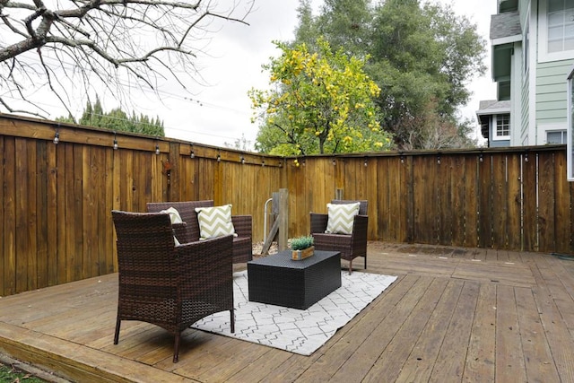 deck featuring an outdoor living space