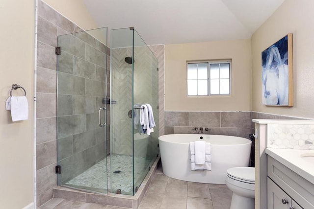 full bathroom with tile patterned flooring, plus walk in shower, lofted ceiling, and vanity