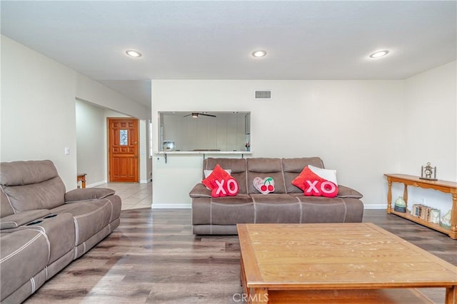 living room with hardwood / wood-style floors