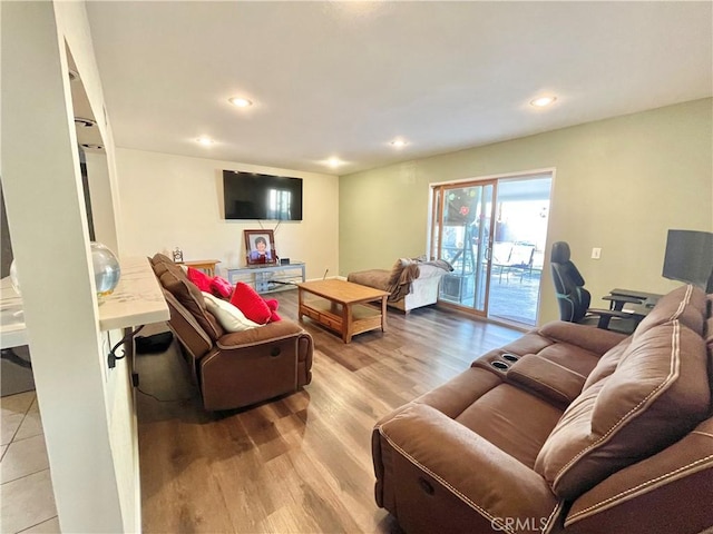 living room with light hardwood / wood-style flooring