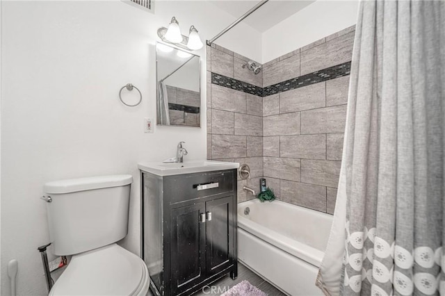 full bathroom featuring vanity, toilet, and shower / bath combo