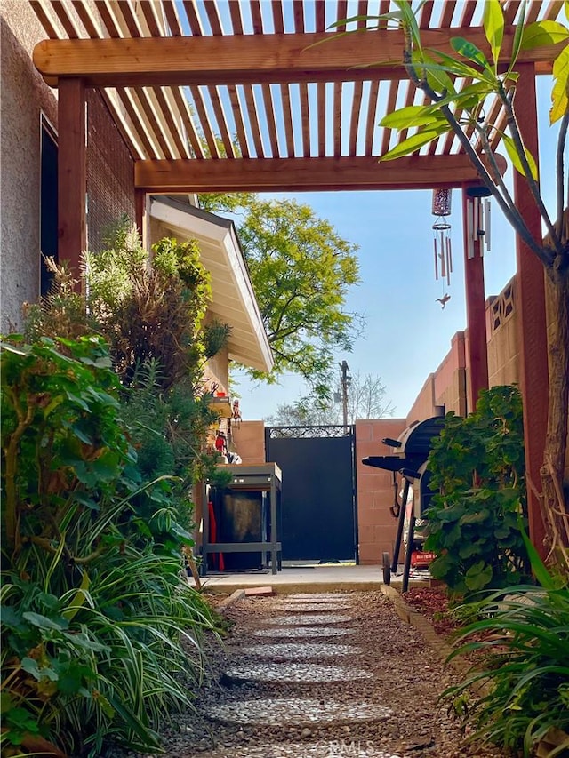 exterior space with a pergola