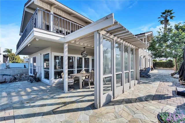 exterior space with a sunroom