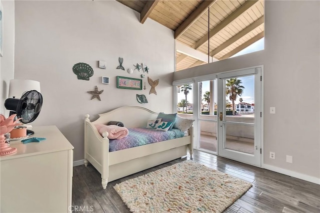 bedroom featuring beamed ceiling, wooden ceiling, dark wood-type flooring, and access to outside