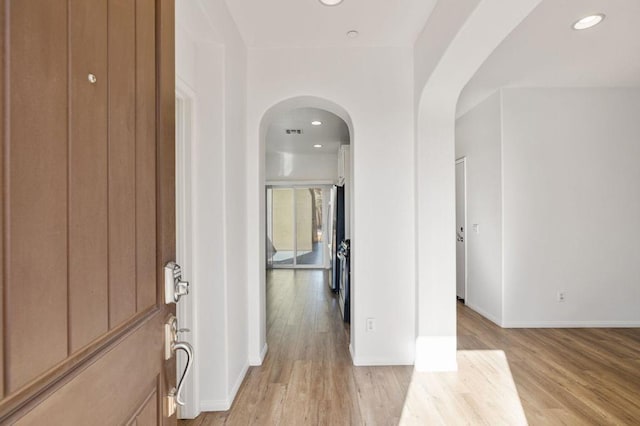 hallway featuring light hardwood / wood-style flooring