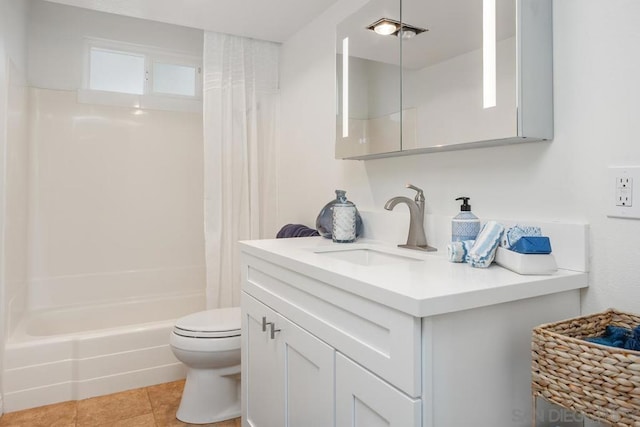 full bathroom featuring vanity, tile patterned flooring, toilet, and shower / bath combo