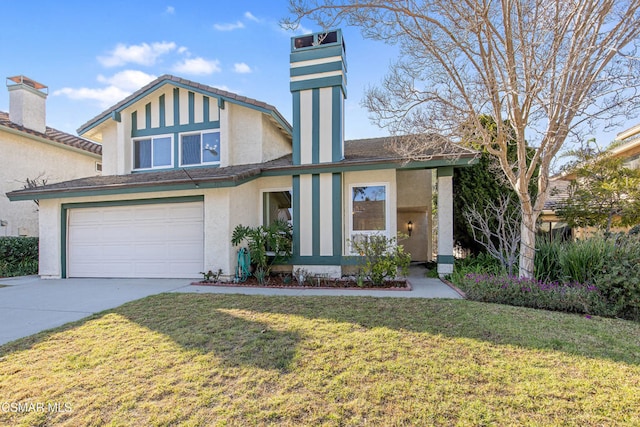 view of front of house with a garage and a front lawn