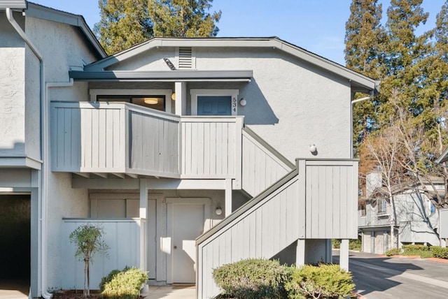 exterior space featuring a balcony