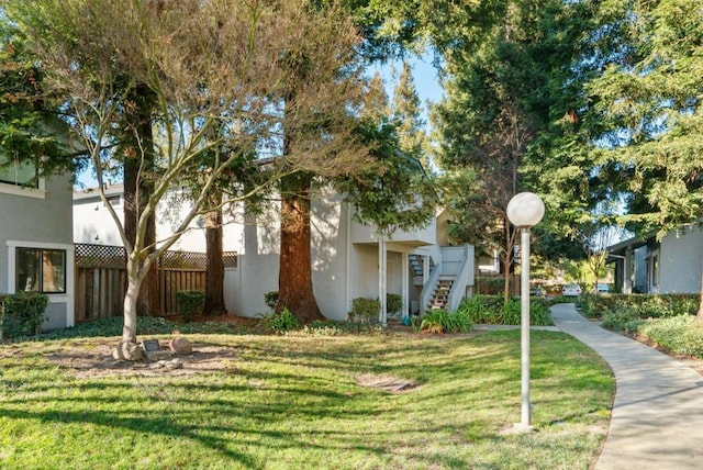 view of front facade with a front yard