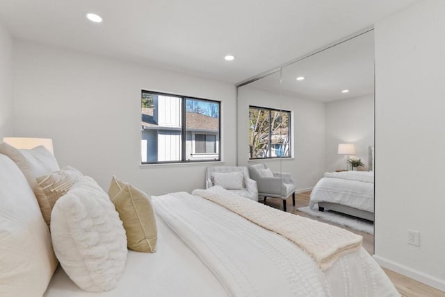 bedroom featuring light hardwood / wood-style floors