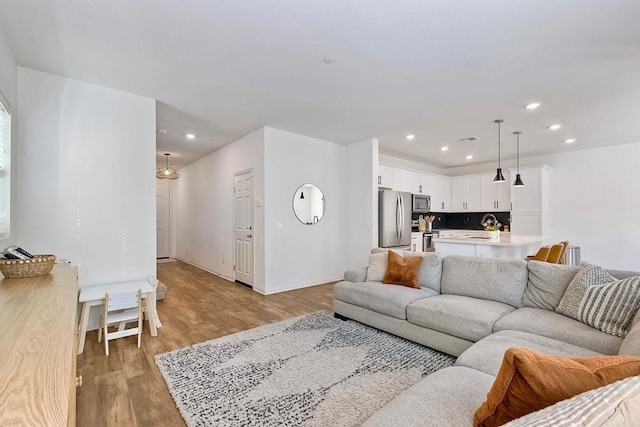 living room featuring light hardwood / wood-style flooring