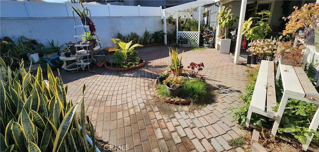 view of patio featuring a pergola