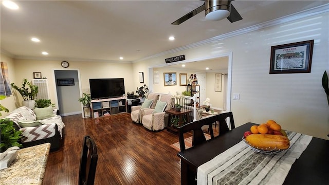 dining space featuring crown molding, dark hardwood / wood-style floors, and ceiling fan